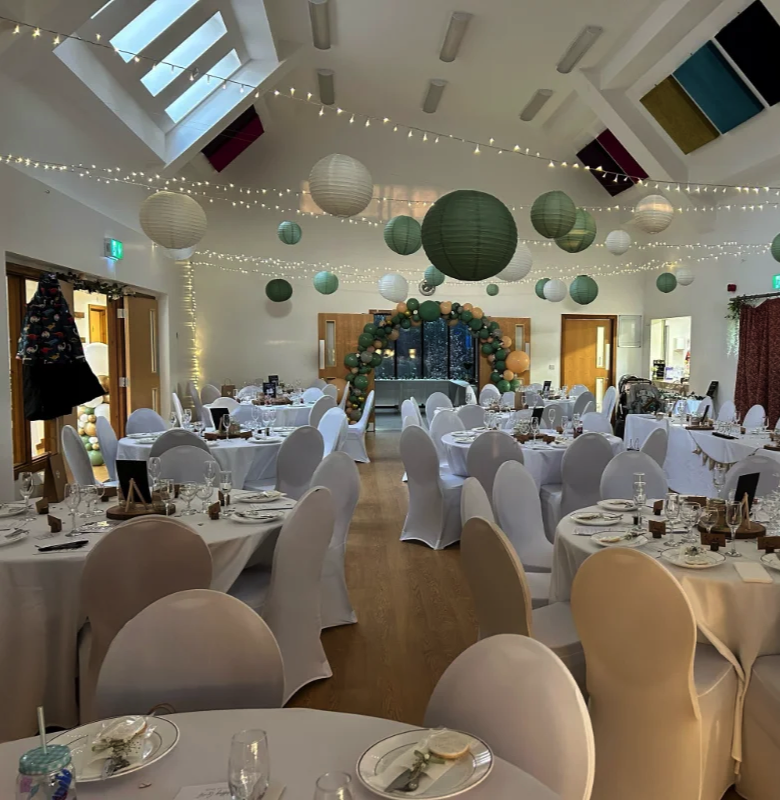 Wedding Tables in Hall with string lights